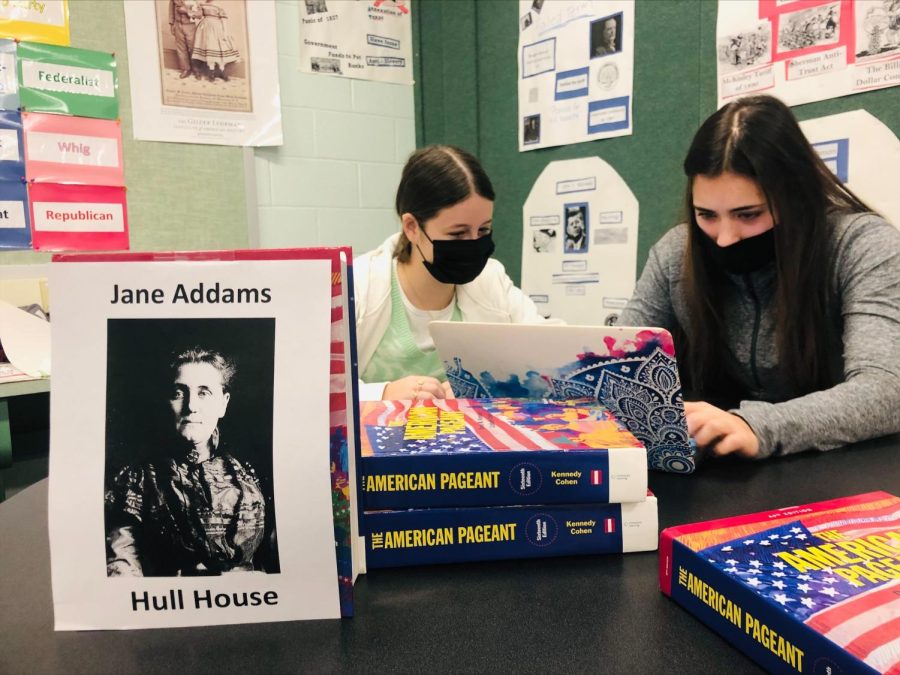 Two AP US History students respond to prompts from the perspective of Jane Addams, founder of the Hull House. Photo by Jennifer Izaguirre.