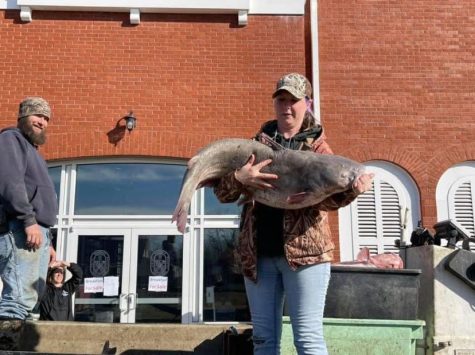 Lady with the winning catfish, almost too big to carry!