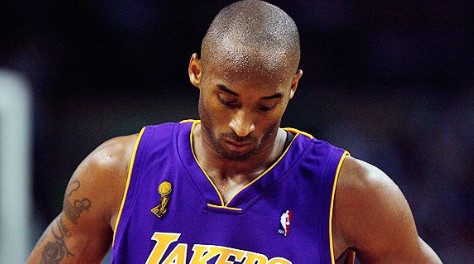 Kobe Bryant looking down in disappointment.